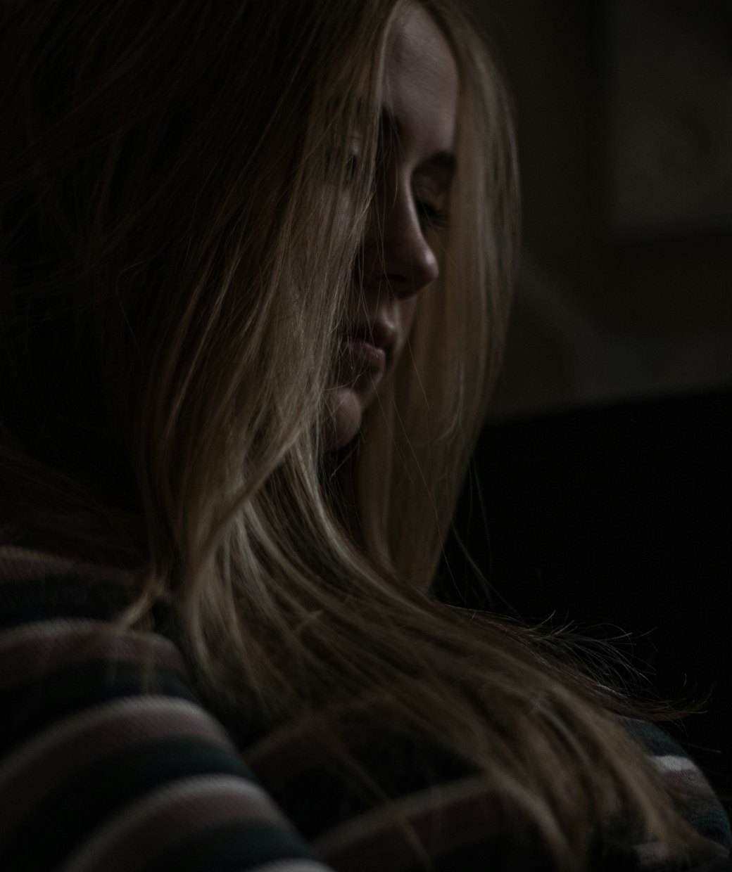 Client with long, glossy blonde hair